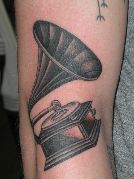 music tattoos. i love music tattoos.